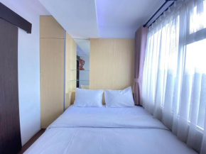 Quite 2BR Apartment AC in Living Room at The Jarrdin Cihampelas By Travelio
